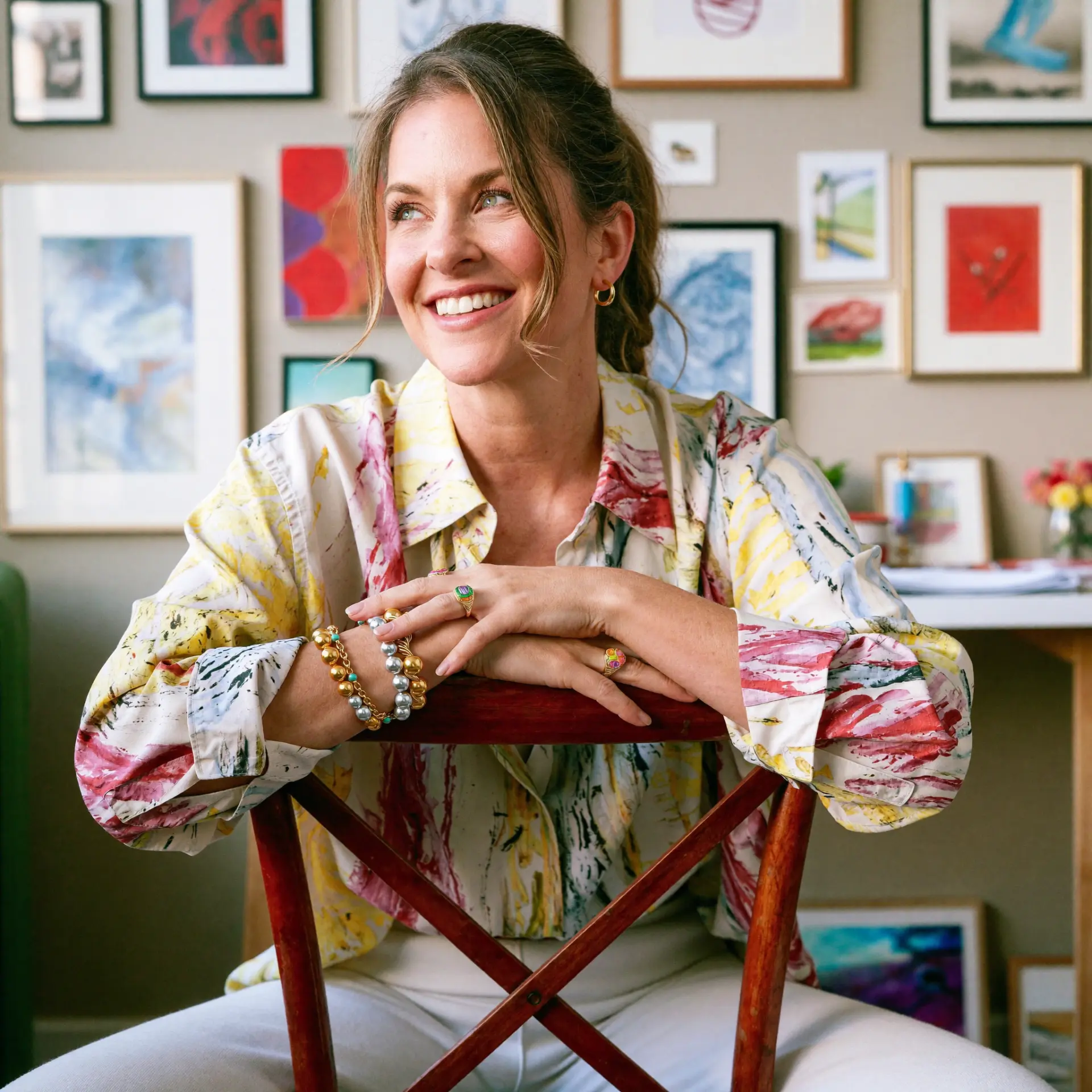 Cassie Stone, gallerist and founder of REvisART, inspecting a fine art print